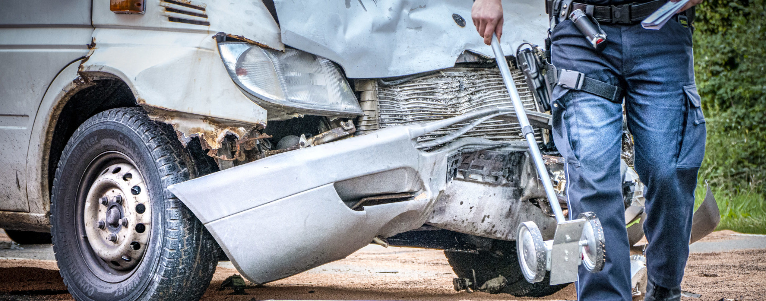 a truck with severe front end damage from an accident after a truck accident