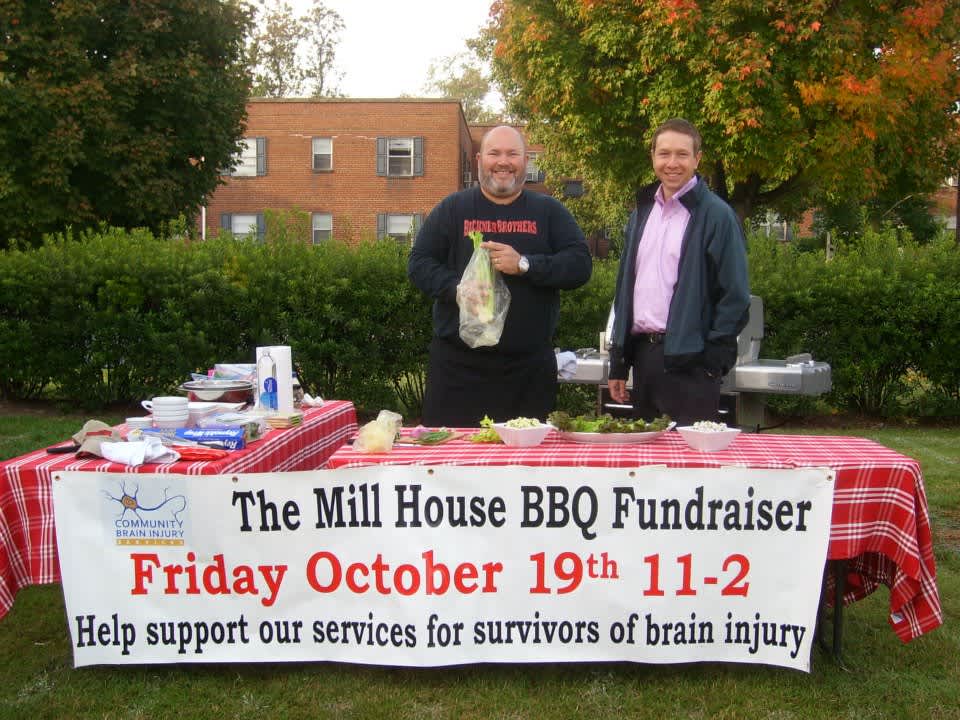 the mill house BBQ fundraiser friday october 19th 11-2, Elliot and Jasonstanding at table