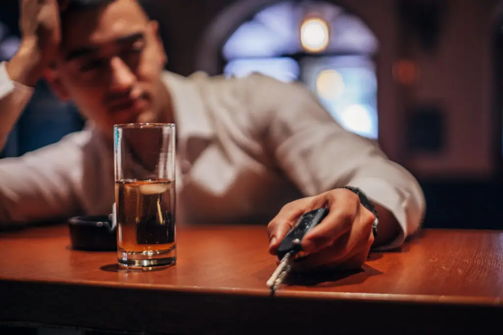 drunk man holding his keys, drunk driver accident