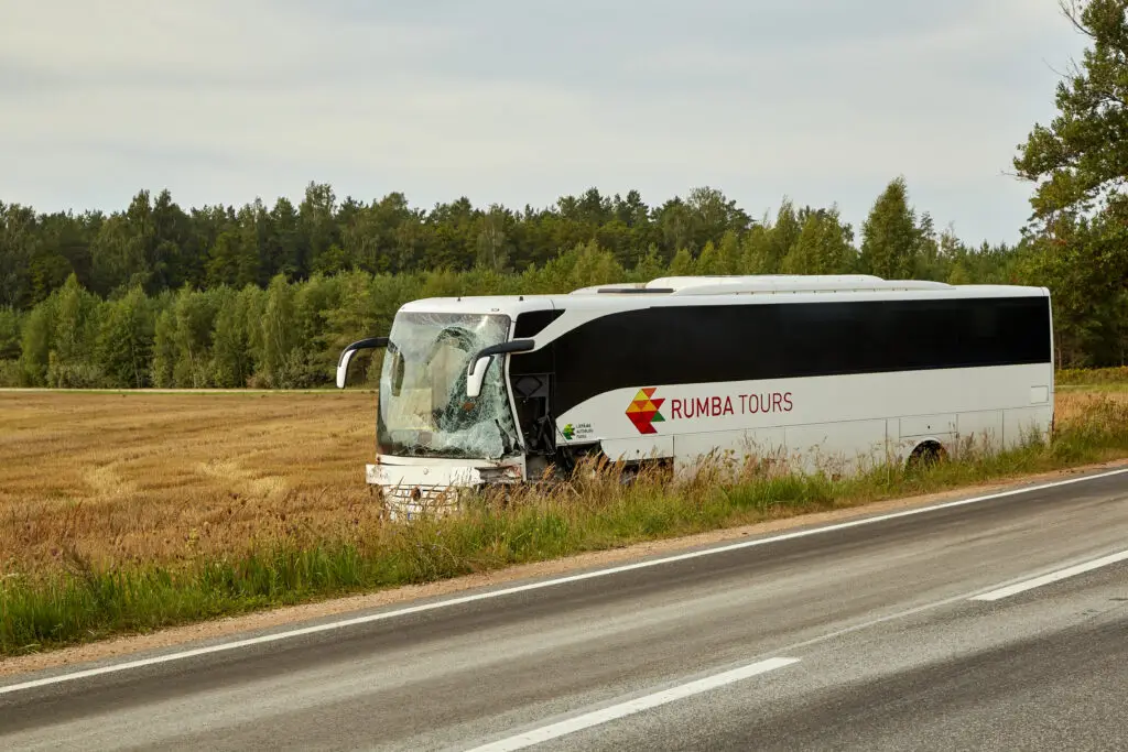 bus accident, bus off the road in an accident with a car