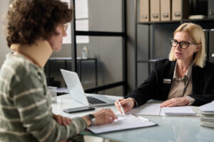 personal injury lawyer consulting with injured client