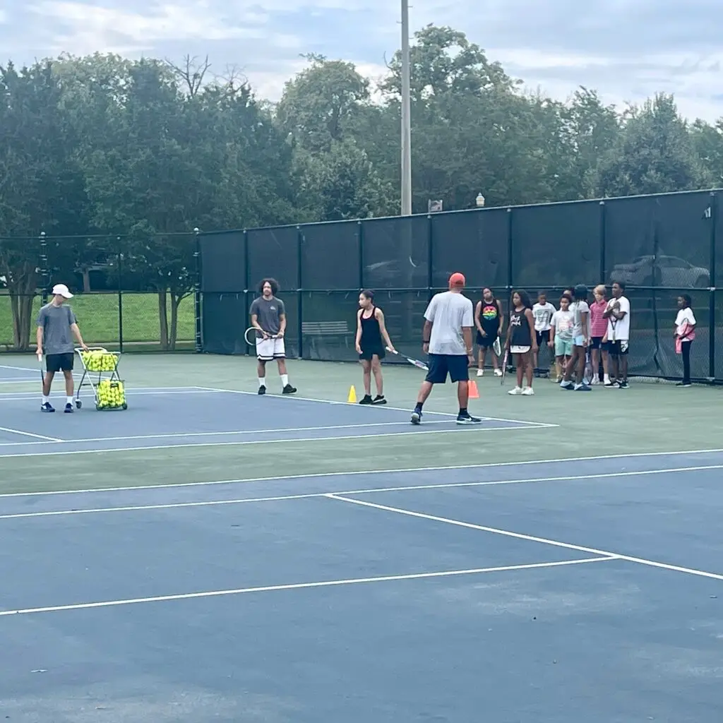 RTA photo of people playing tennis