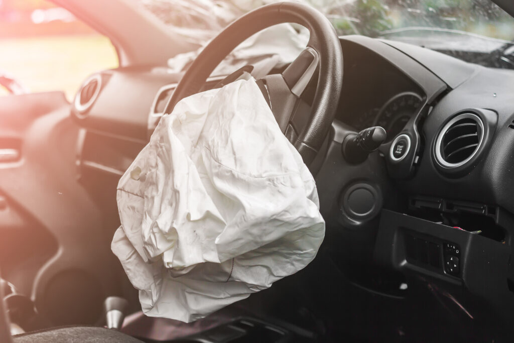 Airbag exploded at a car accident, airbag injuries