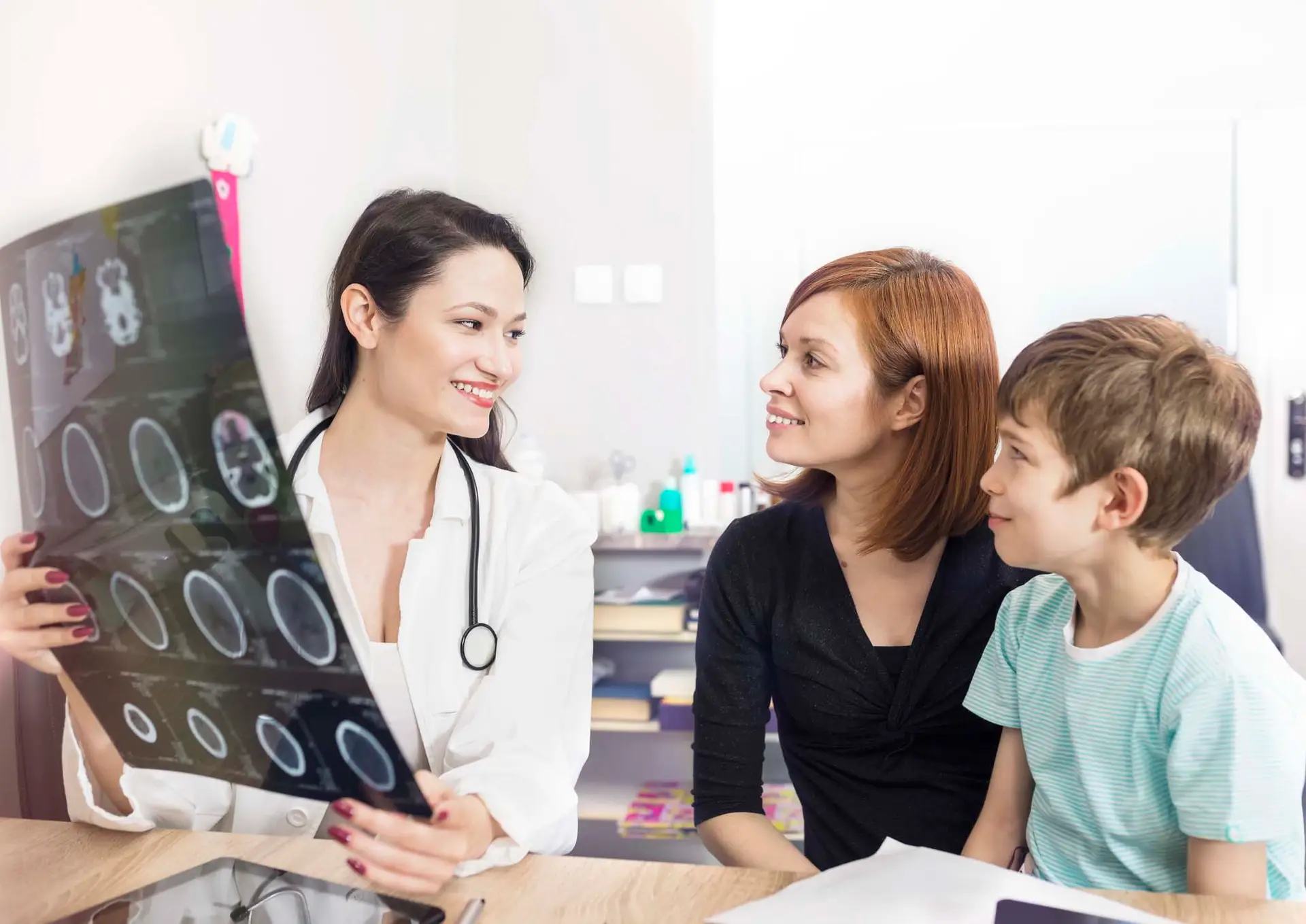 A doctor reviews the results of a scan after an injury.