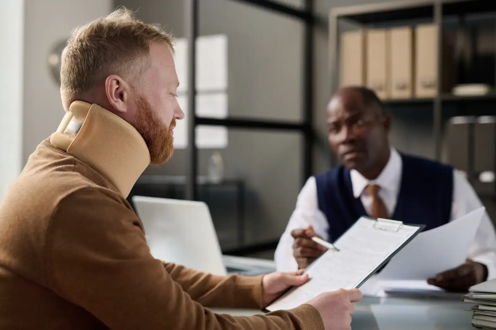 Personal Injury lawyer helping a victim with insurance claims