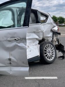 A car that has been damaged in a side-impact collision on a Richmond, Virginia road