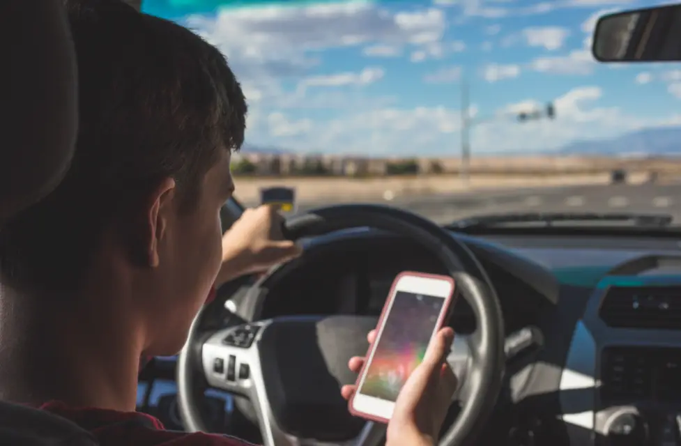 distracted driver in a car