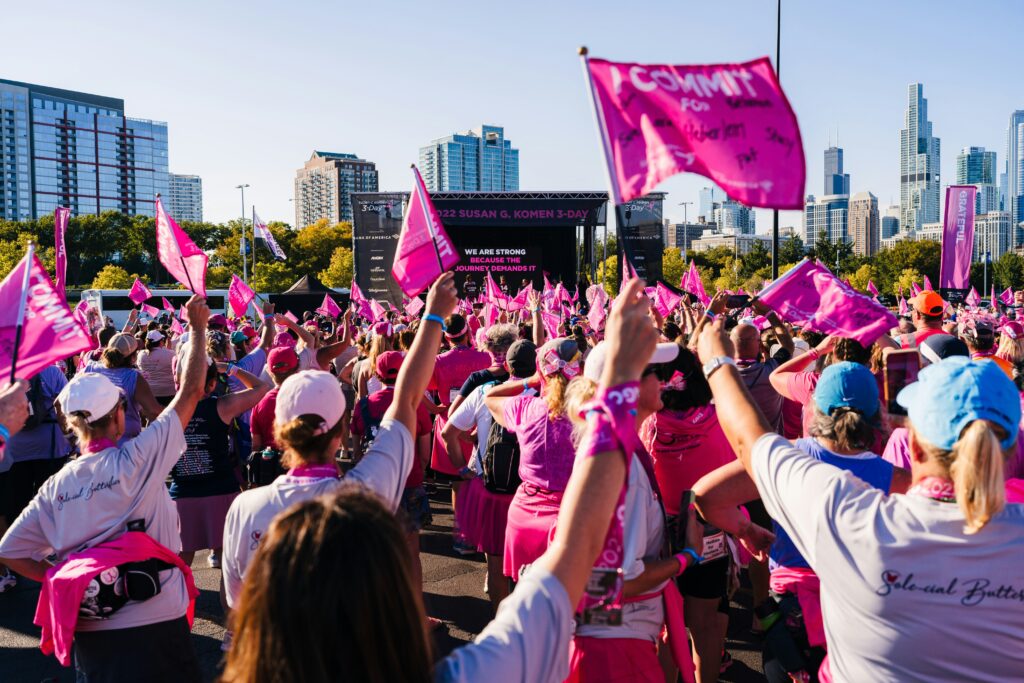 A field of pink flags fly at an October event for breast cancer awareness. 