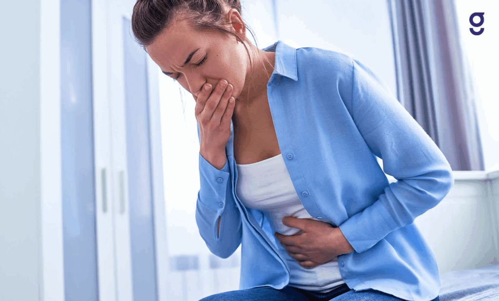 A woman with an upset stomach and nausea after a car accident.